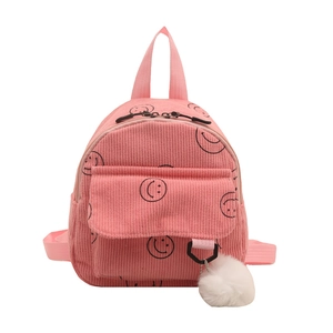 Rosa Cord-Rucksack mit schwarzem Smiley-Muster und einem Plüschball-Anhänger