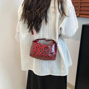 Fashionable red leopard print underarm bag with glossy finish and silver buckle for women