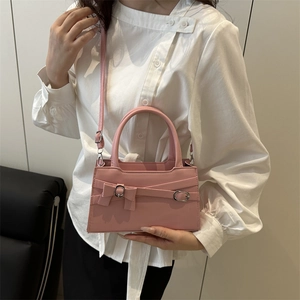 Sac bandoulière carré rose pour femmes avec nœud décoratif et poignée supérieure