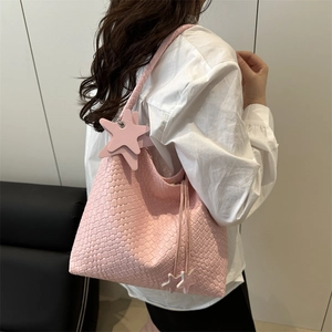 Pink woven tote bag with star charm and drawstring, minimalist chic shoulder bag for women