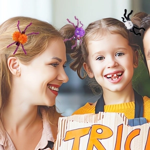 Halloween spider hair clips in orange and purple worn by mother and child for party