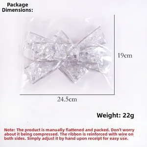 Detailansicht der 24,5x19cm transparenten Silberschleife mit Sternenmuster und Draht