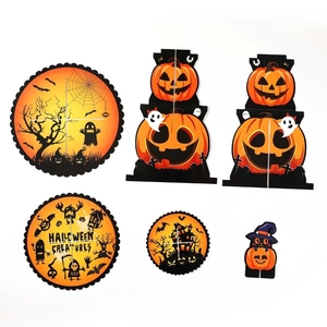 Detailed Halloween paper cake stand set featuring pumpkin and castle party ornaments