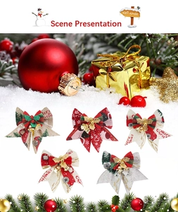 Detailed view of Christmas burlap bows with golden bells and festive prints for decoration