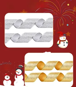 Close-up of glittery gold and silver Christmas ribbons for festive gift wrapping