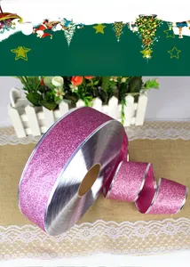 Close-up of sparkling purple glitter ribbon with silver edges for Christmas gift wrapping