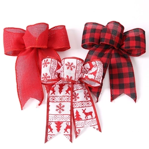 Christmas tree bow set featuring red burlap, buffalo plaid, and festive elk patterns