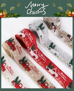 Detail of 6m Christmas ribbons featuring red truck and snowman prints for festive decor