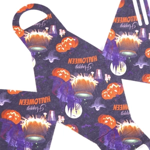 Flat lay of Halloween felt bag with pumpkin and ghost prints on purple background