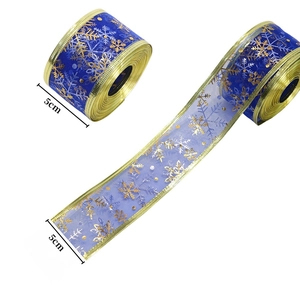 Blue sheer Christmas ribbon with gold snowflake print and 5cm wide gold wire edge