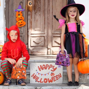 Halloween trick or treat candy bags set with spider and pumpkin felt tote designs