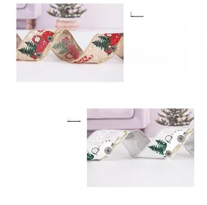 Detail of Merry Christmas car and tree prints on linen ribbons for holiday DIY crafts
