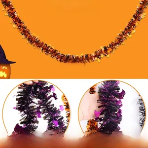 Detail of Halloween tinsel garland with PET pumpkin and bat motifs on flexible wire