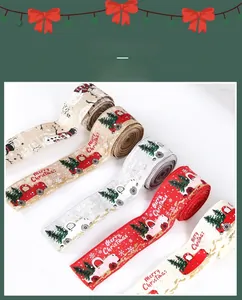 Detail of Christmas burlap ribbons with red truck and festive tree patterns for decoration