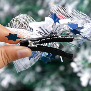 Cartoon mesh Christmas hair clip with silver fringe and star detail for holiday party decor