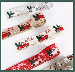Detail of Christmas ribbons with vintage truck and snowman prints in five assorted colors