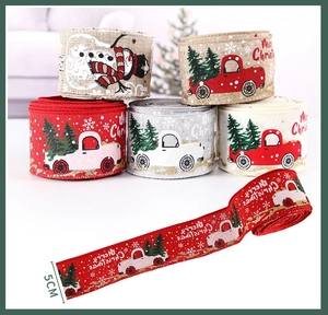 Detail of 5cm Christmas linen ribbons with vintage truck and snowman prints for decoration