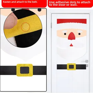 Detail showing adhesive application and Santa felt door decoration on a white door
