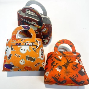 Detailed set of three Halloween felt gift bags featuring pumpkin, ghost and spider motifs
