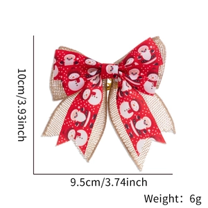 Detailed view of 10cm Christmas bow with red snowman ribbon and natural linen base