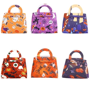 Set of 6 Halloween felt candy bags with ghost, spider, and pumpkin festive patterns