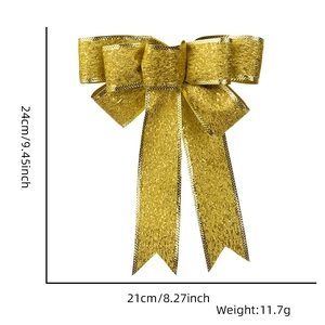 Size specifications for gold sequined Christmas bow measuring 24cm by 21cm and 11.7g