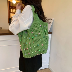 Boho green crochet shoulder tote bag with colorful pearls for seaside vacation