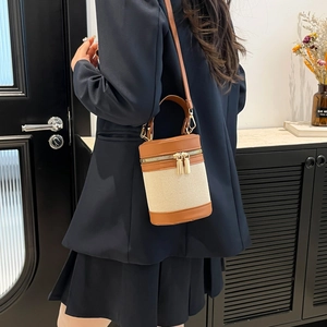 Fashionable mini canvas and leather bucket bag for women with golden zipper and strap