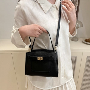 Minimalist black Saffiano leather shoulder bag with golden buckle for spring fashion