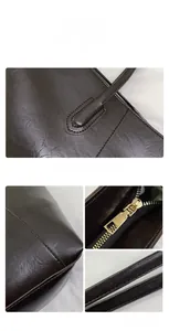 Detail view of coffee brown tote bag with premium leather texture and gold zipper closure