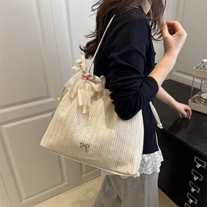 French style straw tote bag with floral lace bow and silver butterfly charm