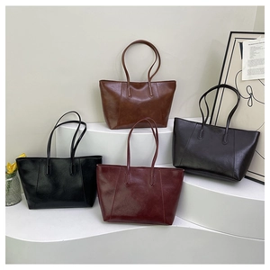 Group view of minimalist leather tote bags in black brown coffee and burgundy colors