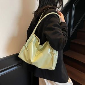Bright green patent leather shoulder tote bag for women with stylish drawstring knots