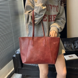 Retro deep red large capacity tote bag with glossy faux leather and dual shoulder straps