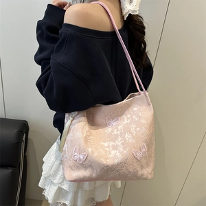 Pink jacquard tote bag with embroidered butterflies and tassel in retro style