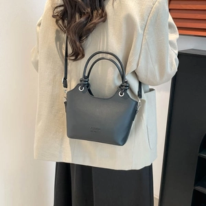 Vintage dark grey bucket bag with Fashion M.C.Bag lettering and knotted handle
