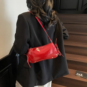 Retro red patent leather baguette bag with silver rivets and side bow accents