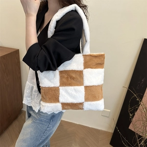 Brown and white checkerboard plush tote bag with thick shoulder strap for winter