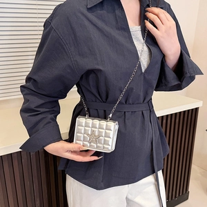 Chic silver square crossbody bag with quilted diamond pattern and star detail