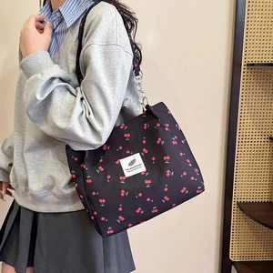 Black cherry print shoulder bag with chain strap and logo patch for women