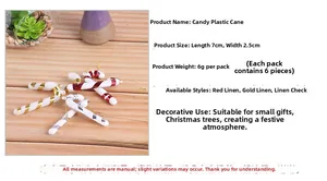 Detailed view of red and white plastic Christmas candy cane ornaments with gold hanging strings