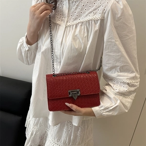 Chic red woven square crossbody bag with vintage metal lock and chain strap for women