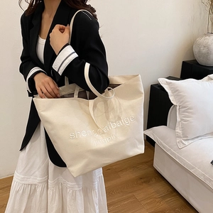 Stylish off-white canvas tote bag with letter print for women's daily casual use