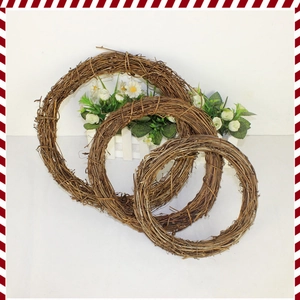 Three assorted sizes of natural woven wicker wreaths for DIY Christmas floral decorations