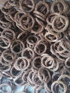 Macro detail of hand-woven natural rattan rings for Christmas DIY craft and floral decor