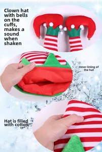 Détail du chapeau d'elfe de Noël à rayures rouges et blanches avec grelots et pompon