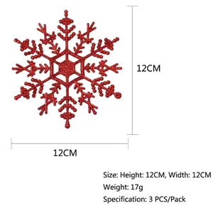 Detail of red glitter snowflake ornament showing 12cm size and sparkling texture