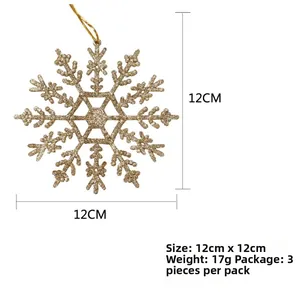 Detail view of 12cm gold glitter snowflakes for Christmas tree decoration set of 3