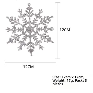 Detail view of a 12cm silver glitter plastic snowflake ornament for Christmas tree decor