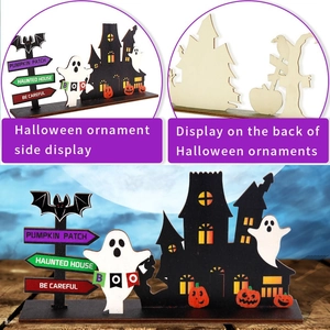 Halloween wooden castle table decor with ghosts, pumpkins and spooky BOO sign stand